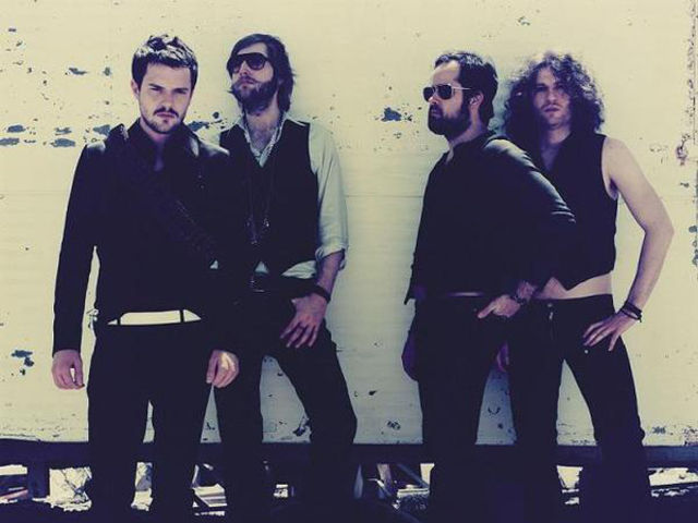 Guitarist Dave Keuning (far right) takes the stripping down a step too far